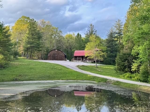 surrounding community with a lawn