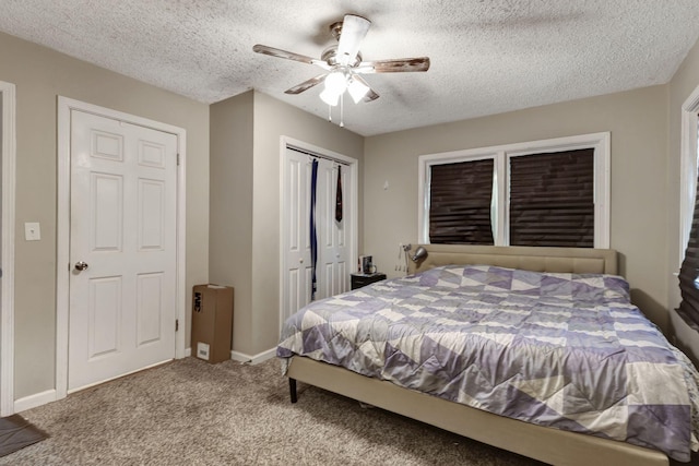 608 Dean Rd, Clarksville, TN 37040 - bedroom with carpet, a ceiling fan, a closet, a textured ceiling, and baseboards