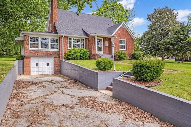 view of front of home featuring aphalt driveway, an attached garage, a chimney, and brick siding