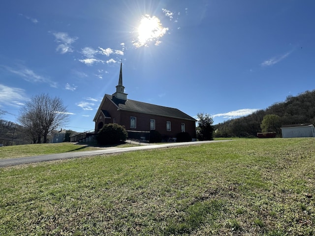 view of property exterior featuring a yard