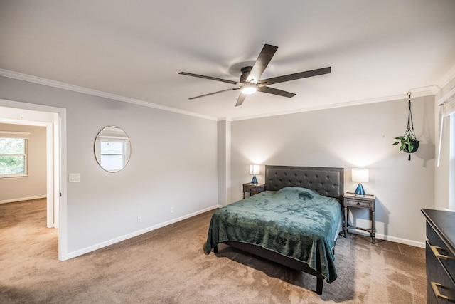 bedroom featuring crown molding, carpet floors, baseboards, and ceiling fan