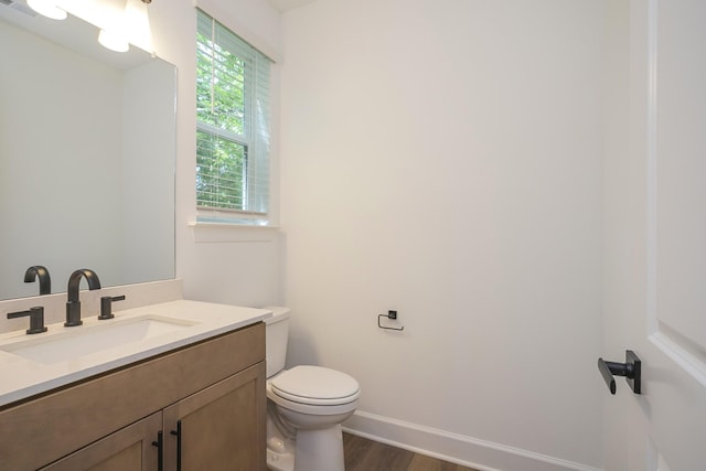 138 W Cassa Way, Mount Juliet, TN 37122 - bathroom with toilet, wood finished floors, vanity, and baseboards