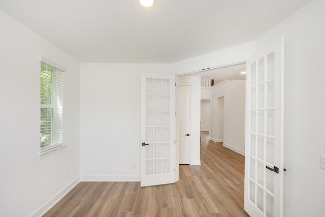 138 W Cassa Way, Mount Juliet, TN 37122 - spare room with french doors, light wood-style floors, baseboards, and recessed lighting