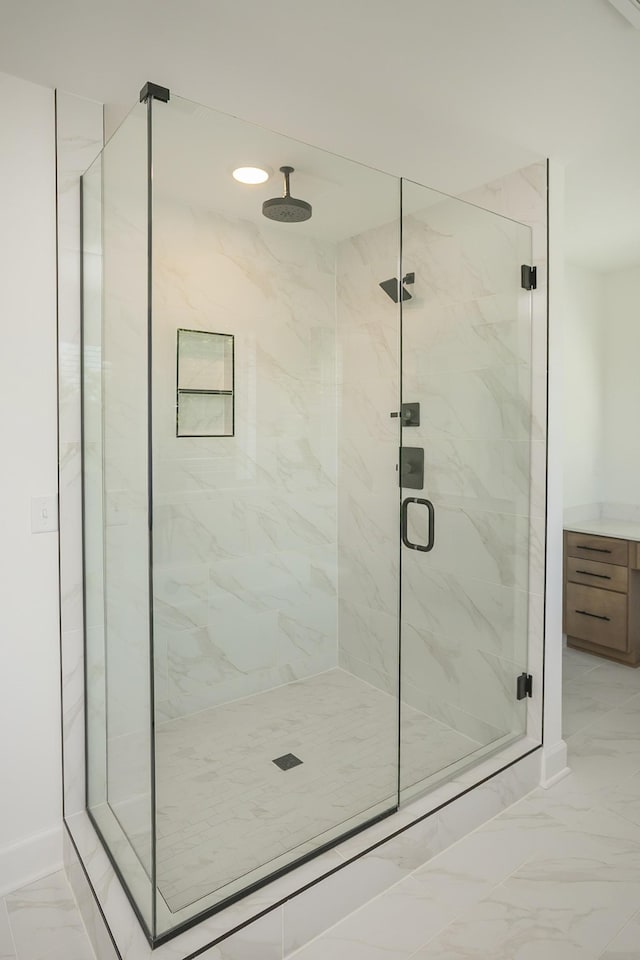 138 W Cassa Way, Mount Juliet, TN 37122 - bathroom featuring marble finish floors, a marble finish shower, baseboards, and vanity