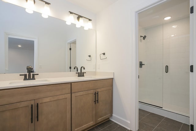 138 W Cassa Way, Mount Juliet, TN 37122 - bathroom featuring double vanity, a shower stall, and baseboards
