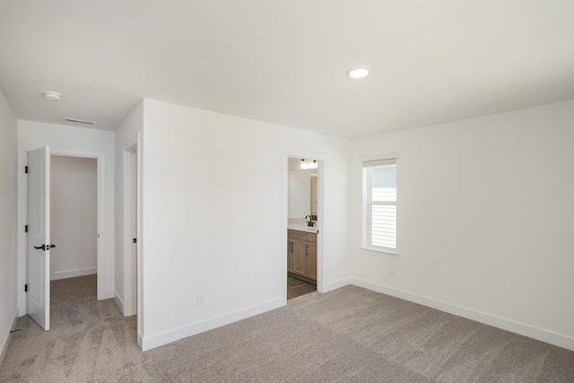 138 W Cassa Way, Mount Juliet, TN 37122 - unfurnished bedroom featuring light carpet, baseboards, and ensuite bath