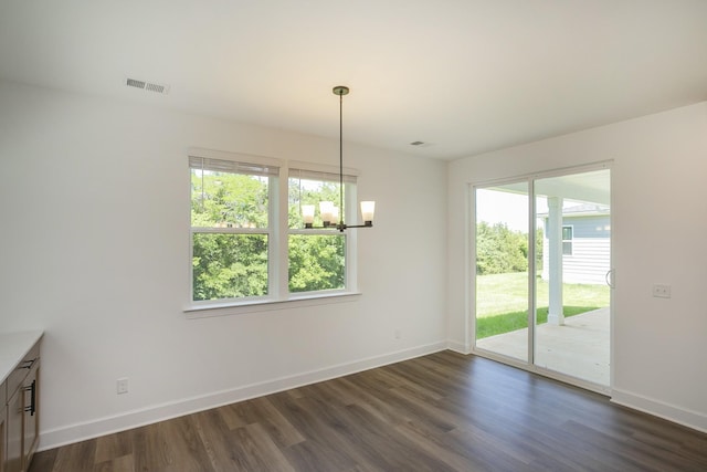 138 W Cassa Way, Mount Juliet, TN 37122 - unfurnished dining area with dark wood-type flooring, a chandelier, and baseboards
