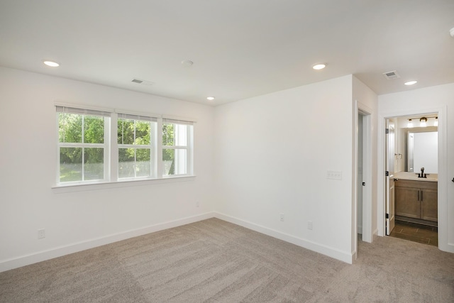 138 W Cassa Way, Mount Juliet, TN 37122 - unfurnished bedroom with light carpet, baseboards, recessed lighting, a sink, and ensuite bathroom