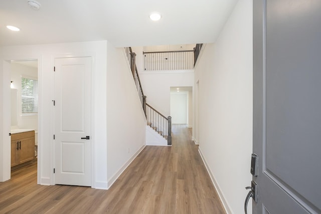 138 W Cassa Way, Mount Juliet, TN 37122 - corridor with light wood-type flooring, stairway, baseboards, and recessed lighting