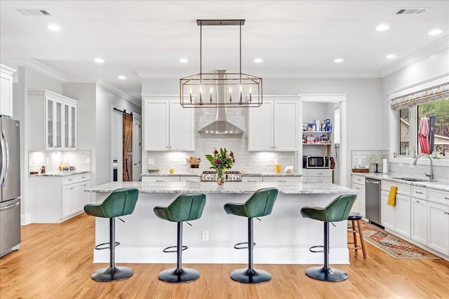 1520 Raulston Falls Rd, Jasper, TN 37347 - kitchen with a sink, tasteful backsplash, wall chimney exhaust hood, crown molding, and appliances with stainless steel finishes