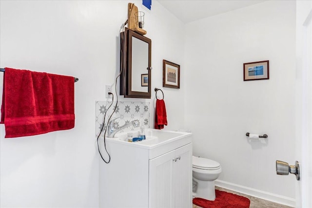 1520 Raulston Falls Rd, Jasper, TN 37347 - bathroom featuring toilet, baseboards, and vanity