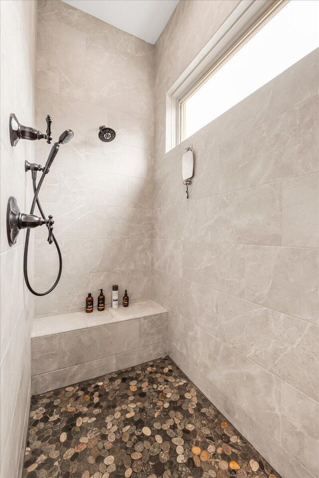 1520 Raulston Falls Rd, Jasper, TN 37347 - bathroom with a tile shower and stone finish flooring