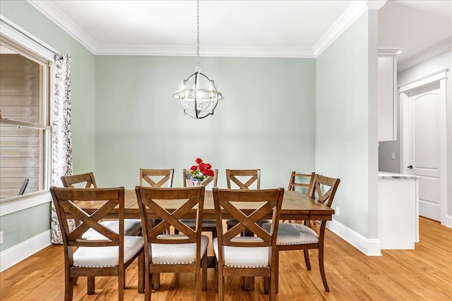 1520 Raulston Falls Rd, Jasper, TN 37347 - dining area with baseboards, light wood-style floors, an inviting chandelier, and crown molding
