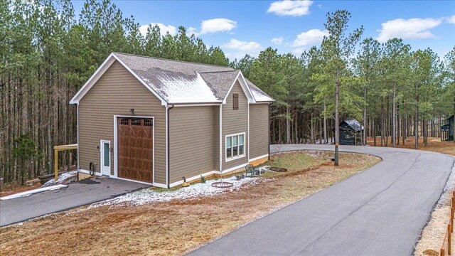 1520 Raulston Falls Rd, Jasper, TN 37347 - view of side of property with a garage