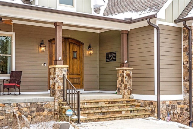 1520 Raulston Falls Rd, Jasper, TN 37347 - doorway to property featuring stone siding, a porch, and roof with shingles