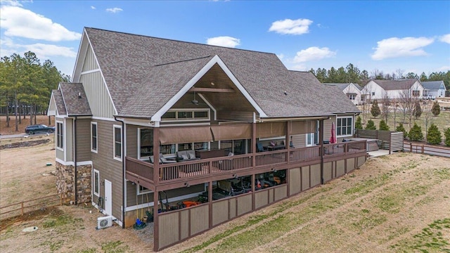 1520 Raulston Falls Rd, Jasper, TN 37347 - back of house with a yard, a wooden deck, roof with shingles, and fence