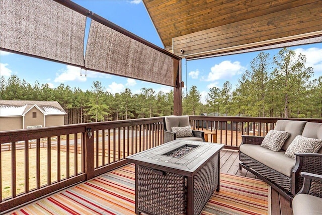 1520 Raulston Falls Rd, Jasper, TN 37347 - wooden terrace with an outdoor living space with a fire pit
