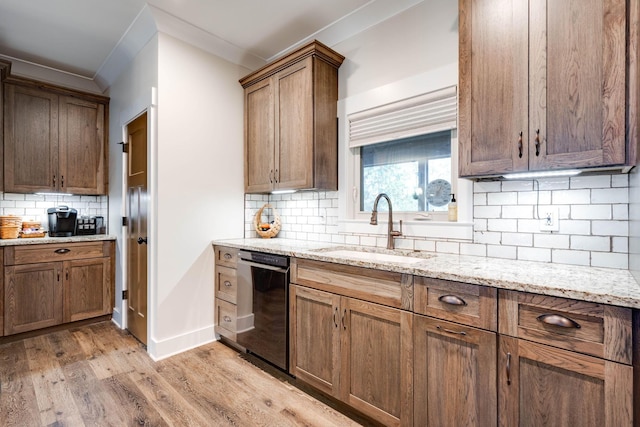 150 Raulston Falls Rd, Jasper, TN 37347 - kitchen with a sink, dishwasher, light wood finished floors, backsplash, and light stone countertops