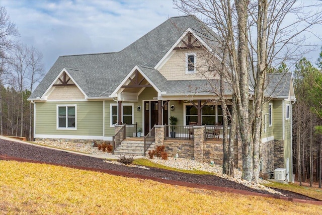 234 Lookout View Dr, Jasper, TN 37347 - craftsman house with covered porch, roof with shingles, a front yard, and stone siding