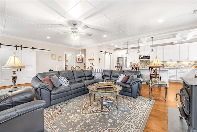 234 Lookout View Dr, Jasper, TN 37347 - living room featuring light wood finished floors, coffered ceiling, a barn door, and a ceiling fan