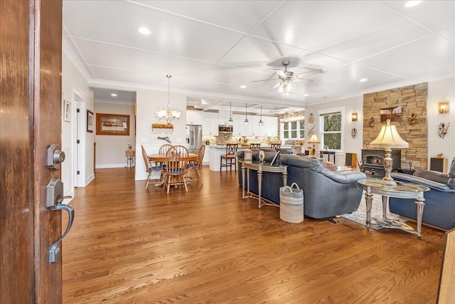 234 Lookout View Dr, Jasper, TN 37347 - living area featuring crown molding, recessed lighting, ceiling fan with notable chandelier, and wood finished floors