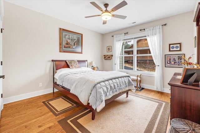 234 Lookout View Dr, Jasper, TN 37347 - bedroom with wood finished floors, visible vents, baseboards, and a ceiling fan