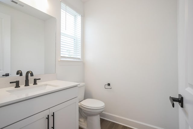135 W Cassa Way, Mount Juliet, TN 37122 - bathroom with wood finished floors, toilet, vanity, and baseboards