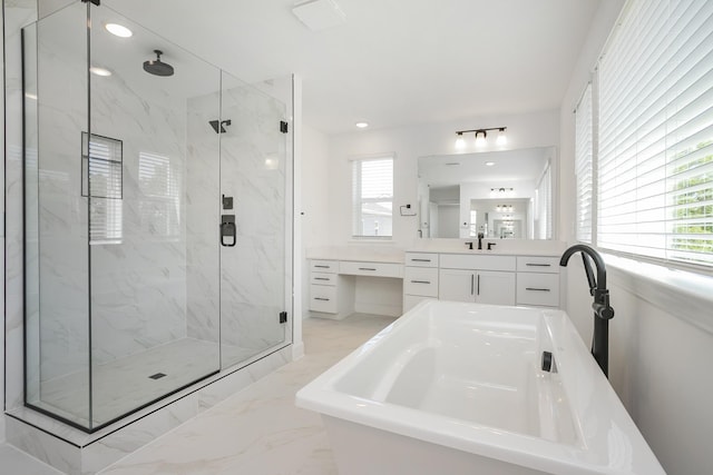 135 W Cassa Way, Mount Juliet, TN 37122 - bathroom with a marble finish shower, marble tiled floors, a soaking tub, vanity, and recessed lighting