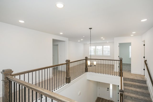 135 W Cassa Way, Mount Juliet, TN 37122 - hallway with an upstairs landing, recessed lighting, a chandelier, carpet floors, and baseboards
