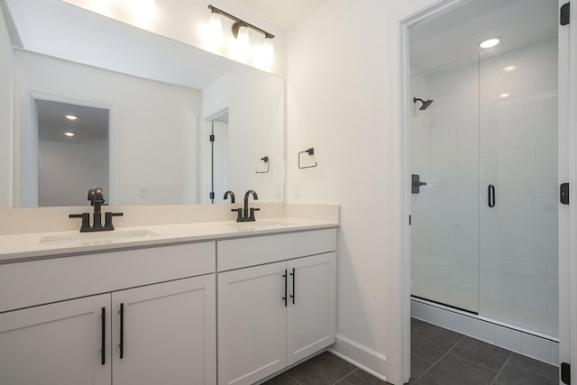 135 W Cassa Way, Mount Juliet, TN 37122 - bathroom with double vanity, a stall shower, baseboards, recessed lighting, and tile patterned flooring