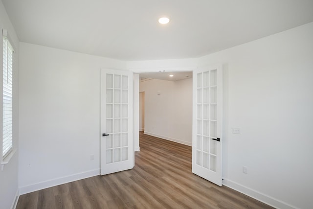 135 W Cassa Way, Mount Juliet, TN 37122 - unfurnished room featuring french doors, wood finished floors, baseboards, plenty of natural light, and recessed lighting