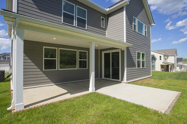 135 W Cassa Way, Mount Juliet, TN 37122 - rear view of property with a patio, a yard, and central AC