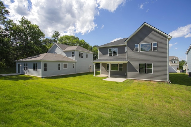 135 W Cassa Way, Mount Juliet, TN 37122 - rear view of property featuring a patio area and a lawn
