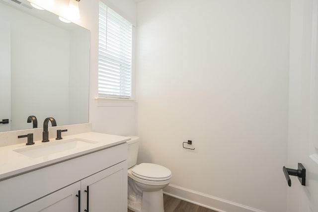 136 W Cassa Way, Mount Juliet, TN 37122 - bathroom with toilet, vanity, wood finished floors, and baseboards