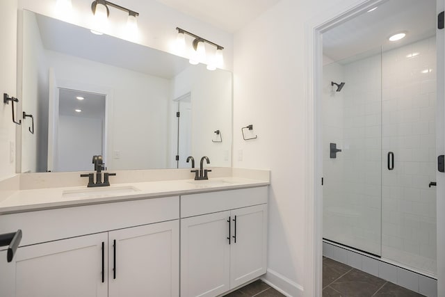 136 W Cassa Way, Mount Juliet, TN 37122 - full bathroom featuring double vanity, a stall shower, baseboards, recessed lighting, and tile patterned flooring
