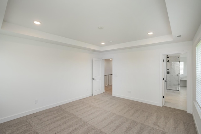 136 W Cassa Way, Mount Juliet, TN 37122 - unfurnished room with a tray ceiling, recessed lighting, baseboards, and light colored carpet