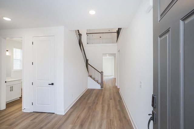 136 W Cassa Way, Mount Juliet, TN 37122 - entrance foyer with light wood-type flooring, stairway, and baseboards