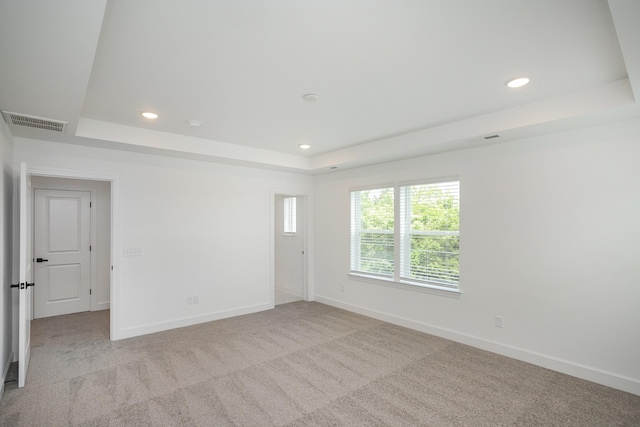 136 W Cassa Way, Mount Juliet, TN 37122 - empty room featuring a tray ceiling, baseboards, recessed lighting, and light carpet