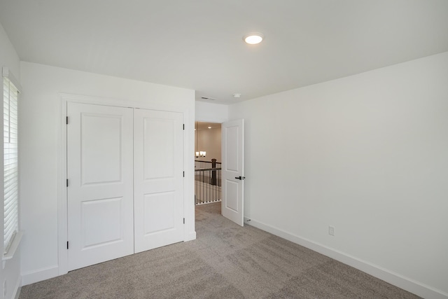 136 W Cassa Way, Mount Juliet, TN 37122 - unfurnished bedroom featuring carpet flooring, baseboards, a closet, and recessed lighting