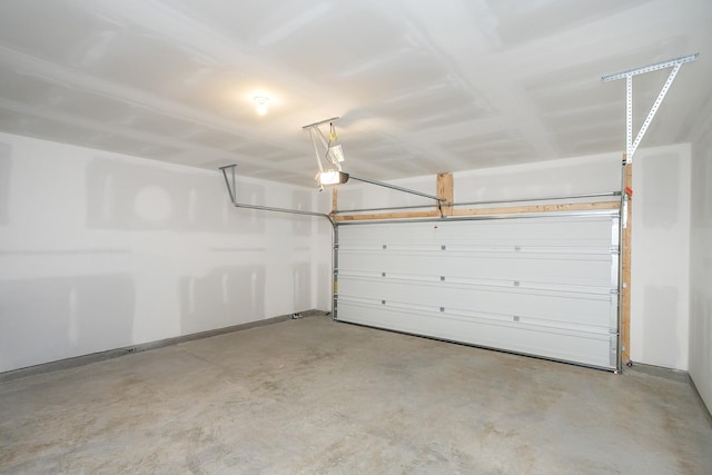136 W Cassa Way, Mount Juliet, TN 37122 - garage featuring a garage door opener and baseboards