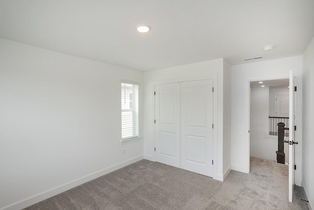 136 W Cassa Way, Mount Juliet, TN 37122 - unfurnished bedroom featuring carpet floors, a closet, baseboards, and recessed lighting