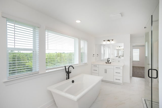 136 W Cassa Way, Mount Juliet, TN 37122 - bathroom with healthy amount of natural light, vanity, and baseboards