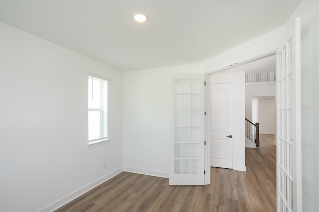 136 W Cassa Way, Mount Juliet, TN 37122 - unfurnished room featuring wood finished floors, baseboards, and french doors