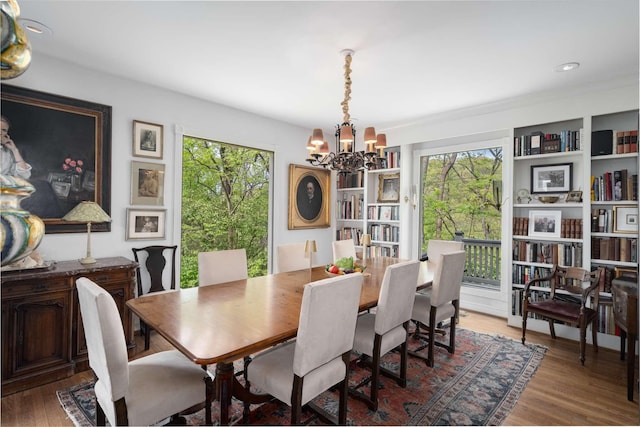 1229 Vintage Pl, Nashville, TN 37215 - dining area with a chandelier, plenty of natural light, and wood finished floors