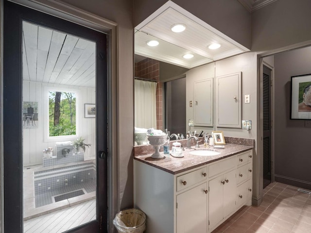 1229 Vintage Pl, Nashville, TN 37215 - full bathroom featuring tile patterned flooring, vanity, crown molding, baseboards, and recessed lighting