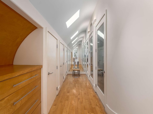 1229 Vintage Pl, Nashville, TN 37215 - hallway featuring light wood-style flooring, vaulted ceiling, and french doors