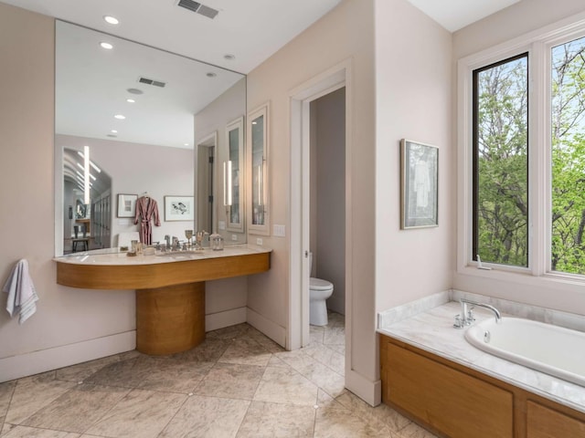 1229 Vintage Pl, Nashville, TN 37215 - full bath featuring toilet, a garden tub, baseboards, a sink, and recessed lighting