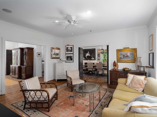 1229 Vintage Pl, Nashville, TN 37215 - living room with wood finished floors, ornamental molding, ceiling fan, and baseboards