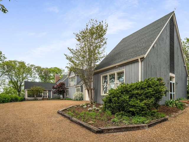 1229 Vintage Pl, Nashville, TN 37215 - rear view of property featuring a garage and a shingled roof