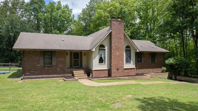 7621 Fernvale Rd, Fairview, TN 37062 - ranch-style house featuring brick siding, a chimney, and roof with shingles